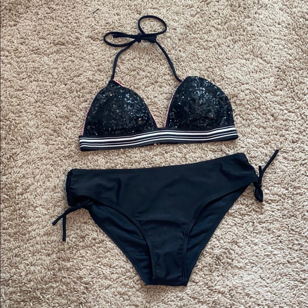 VS bathing suit top. With black target bottoms.